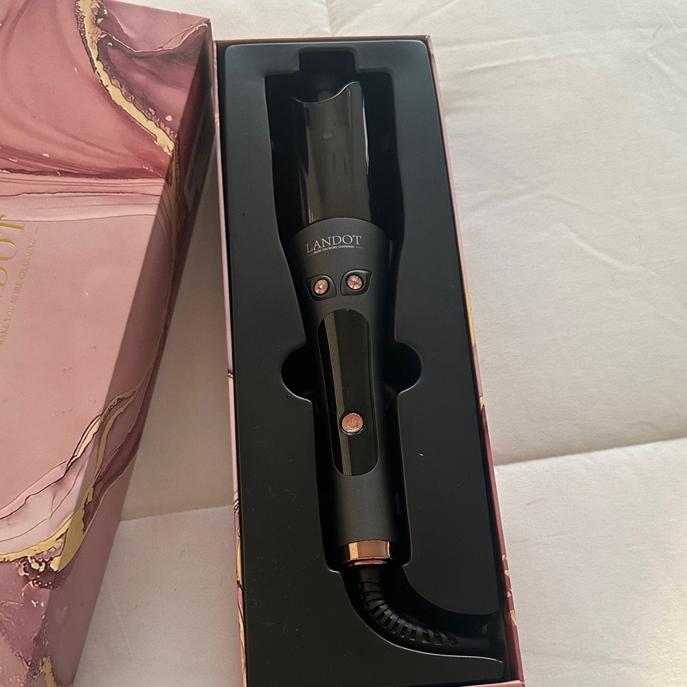 Landot rotating curling iron
